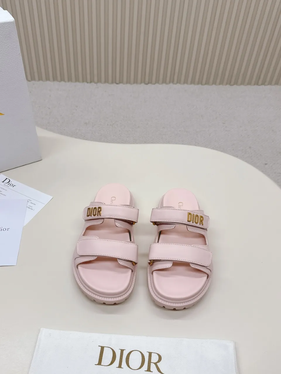 👟👟Ex-factory price 460👟👟 This black sheepskin DiorAct sandal is fashionable. Paired with an insole that fits the shape of your foot, it's made of exceptionally lightweight and comfortable leather. The upper straps feature a Velcro closure and feature a gold-finish metal "DIOR" logo. Can be matched with various styles to show modern style. Gold-finish metal "DIOR" logo Two adjustable Velcro straps Leather insole that fits the shape of your foot Soft and lightweight texture EVA sole decorated with Christian Dior's lucky star symbol Made in Italy Size 35--42 (Customized sizes 41 and 42 are non-refundable)